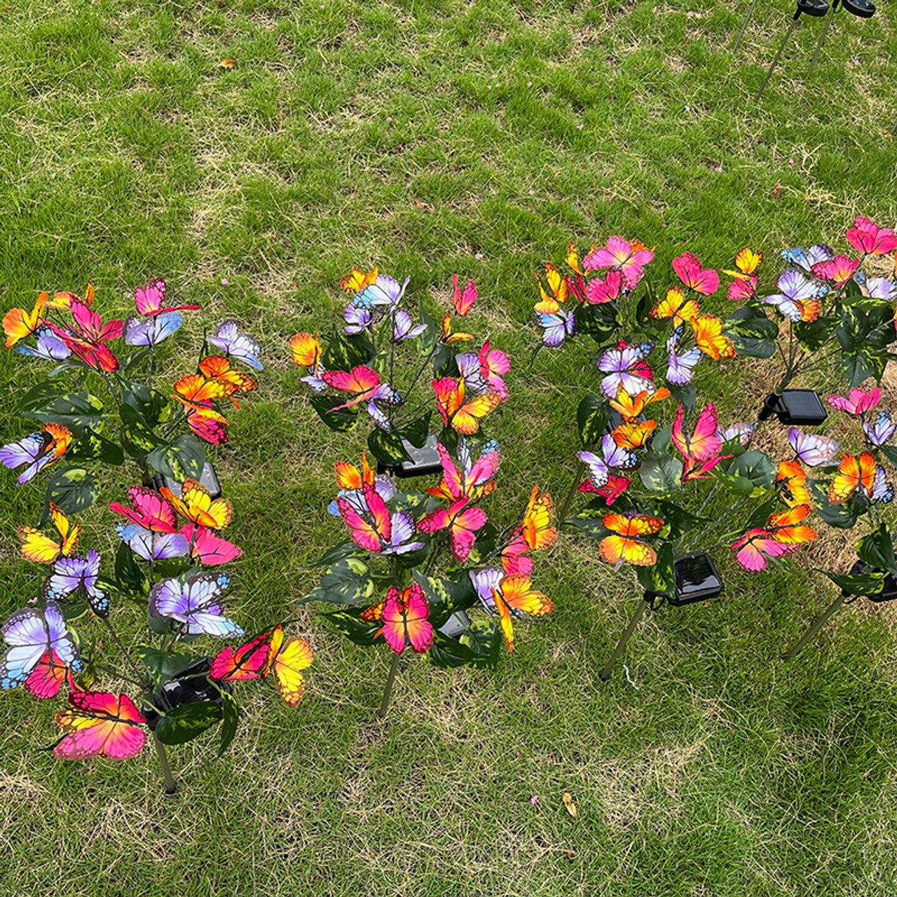Solar powered butterfly garden light